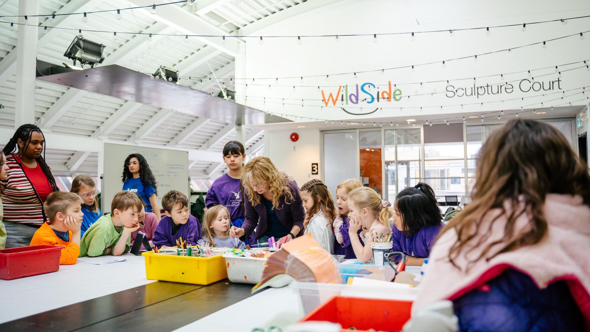 Kids doing arts and crafts at Two Rivers Gallery