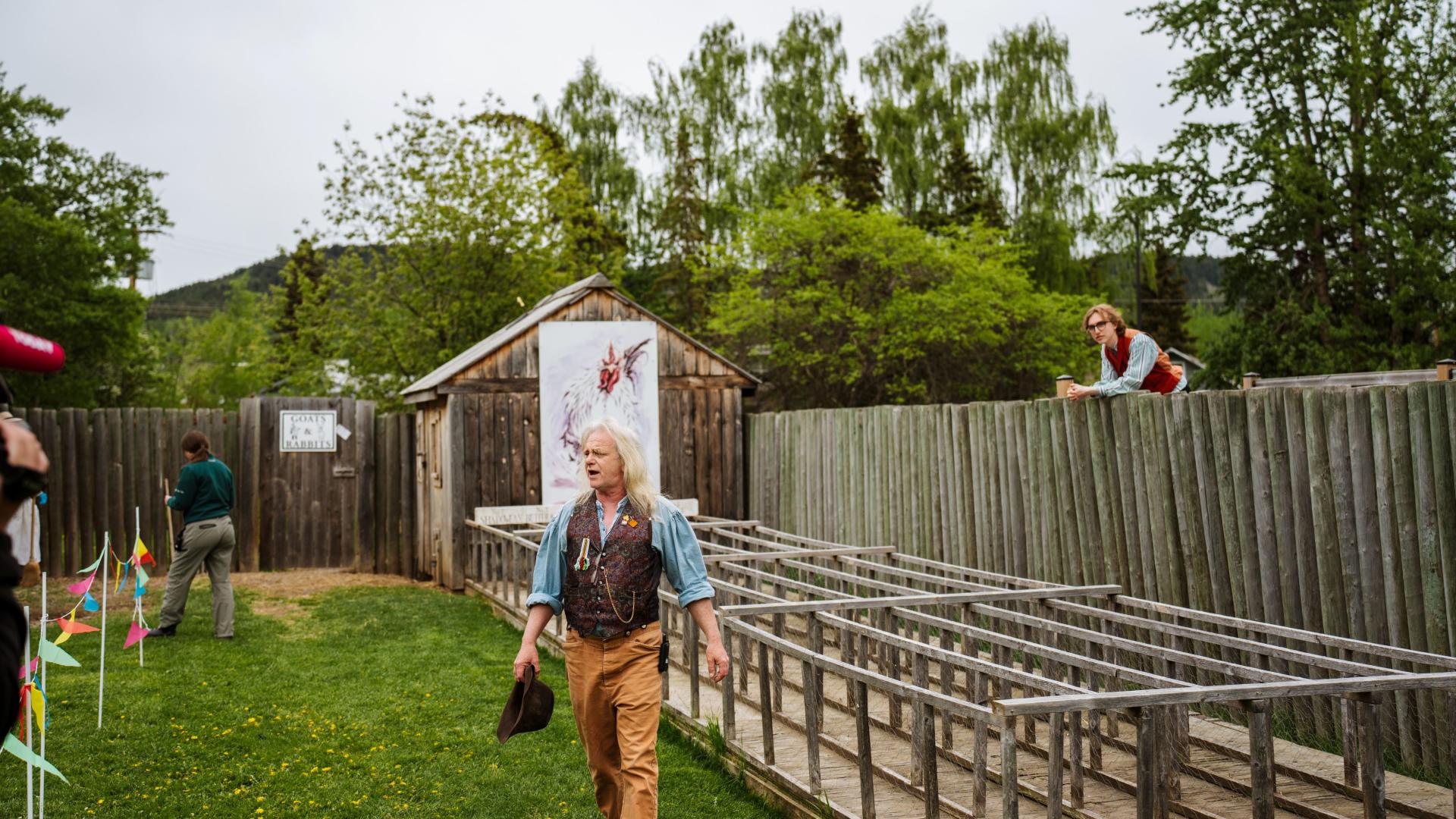 Interpreters prepare a crowd for a chicken race at the Fort St. James National Historic Site
