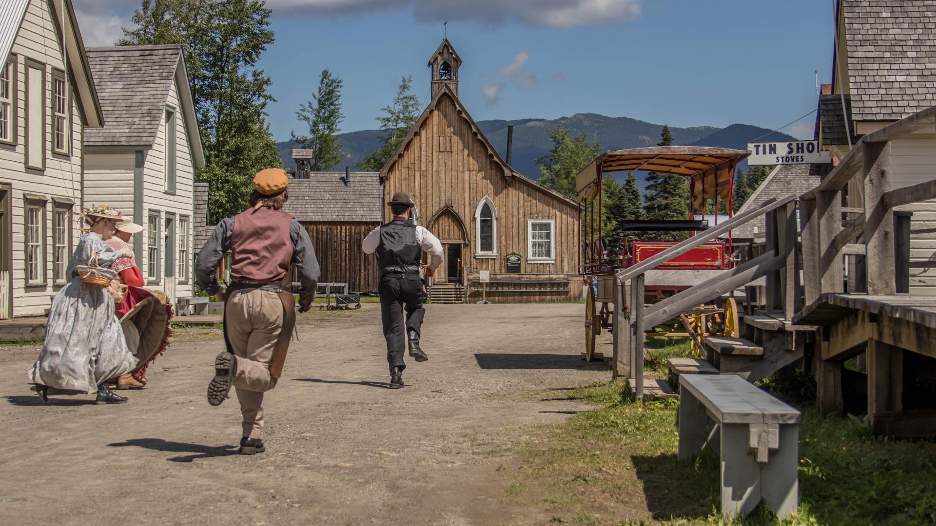 Costumed interpreters run down Barkerville's main street