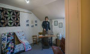 A mannequin at in a replica school room at the Valemount Museum