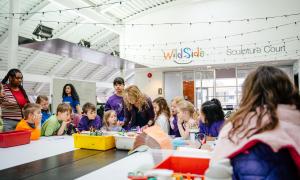Kids doing arts and crafts at Two Rivers Gallery