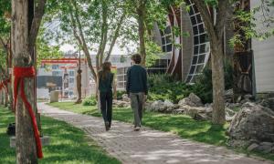 A young pair walk into Two Rivers Gallery