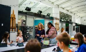 Kids doing arts and crafts at Two Rivers Gallery