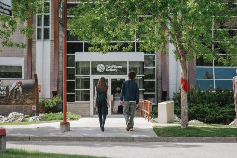 A young pair walk into Two Rivers Gallery