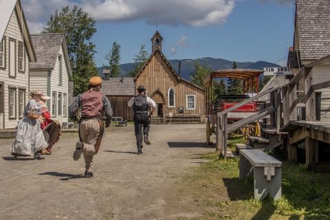 Costumed interpreters run down Barkerville's main street