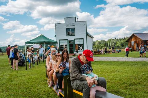 Guests ride the Railway Museum's Cottonwood Minirail at Huble Homestead's Kids Carnival